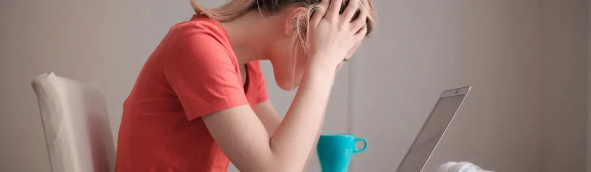 A young person looking at a phone